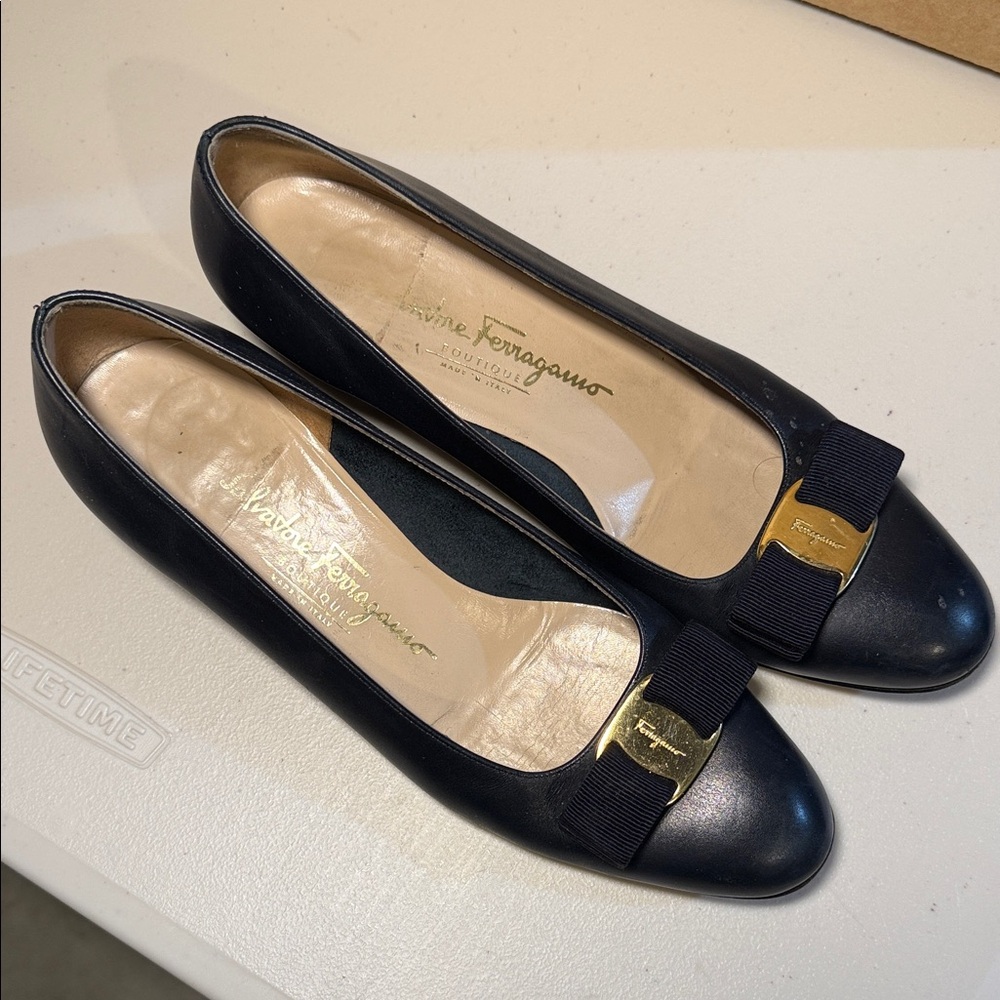 Salvatore Ferragamo Black Flats with Gold Accents